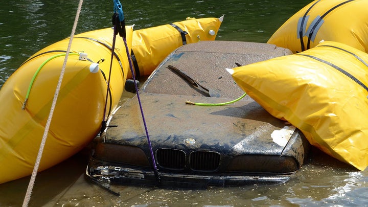 Son pushes BMW into river because he wanted his parents to buy him a Jaguar