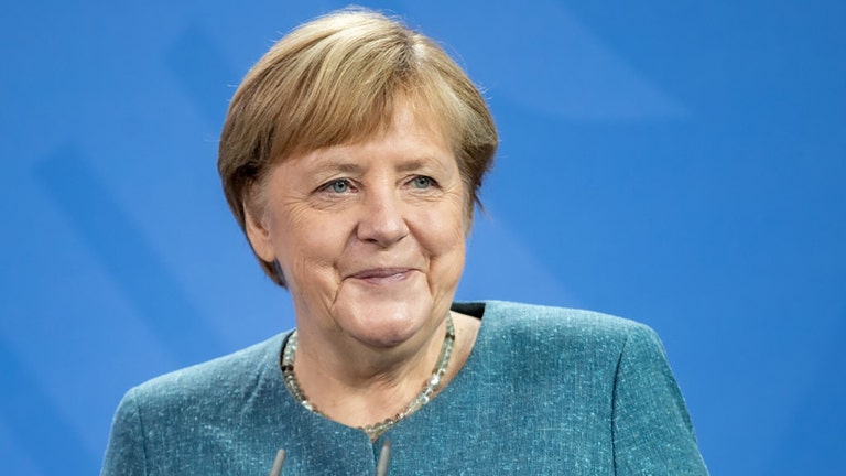 Social Democrats narrowly beat Merkel’s bloc in German vote