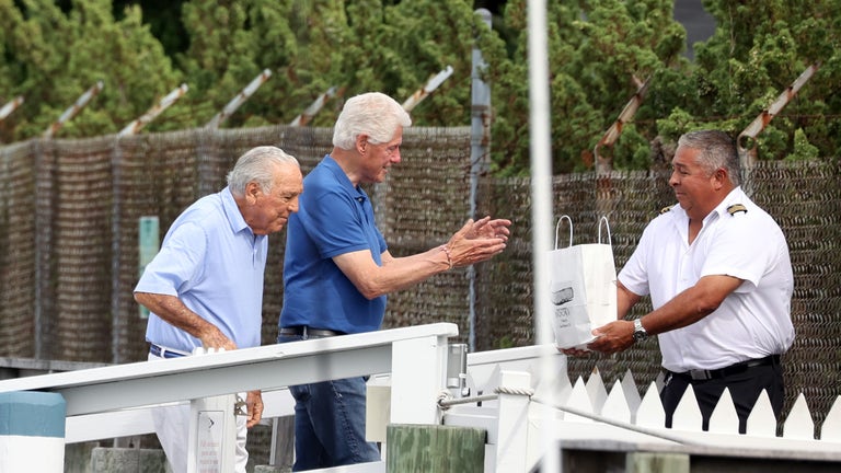 Bill Clinton spotted in Hamptons boarding yacht with Epstein-connected billionaire sugar baron brothers