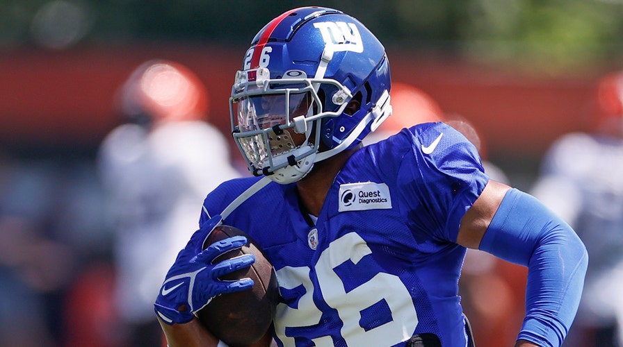 Giants' Saquon Barkley wears FDNY shirt in pregame warmups