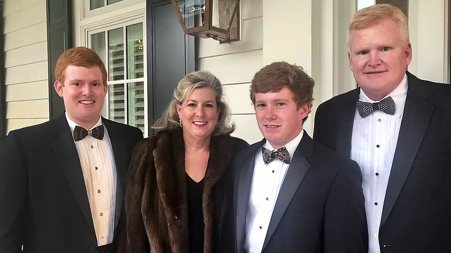 Alex Murdaugh in a tuxedo with wife Maggie and their sons Buster and Paul