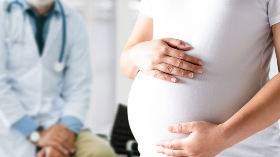 Pregnant woman at doctor's office