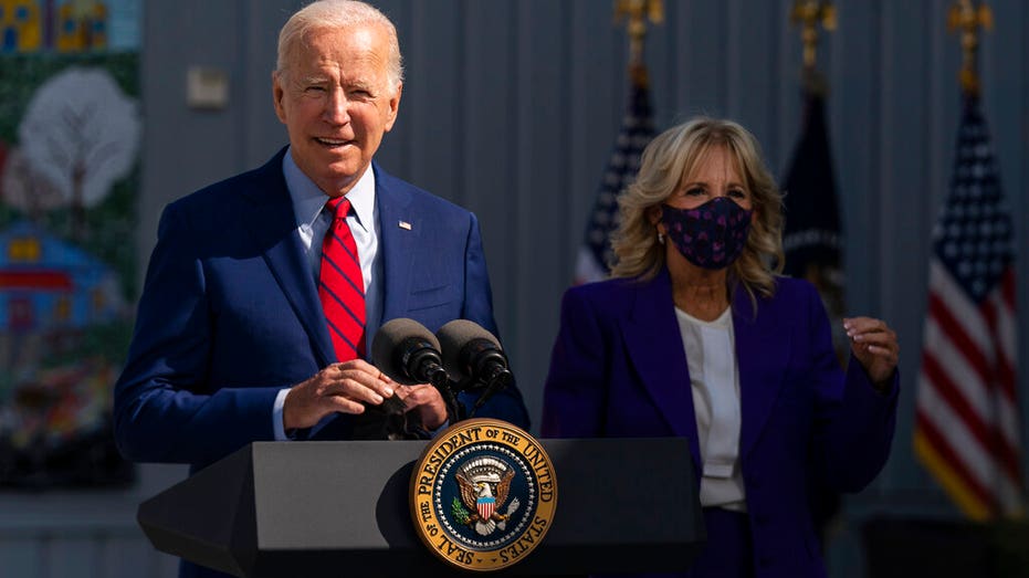 President Biden, with first lady Jill Biden, speaks during a visit at Brookland Middle School in northeast Washington on Sept. 10. 