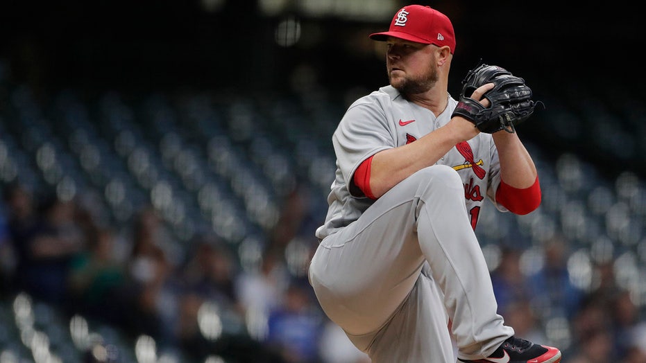 Lester wins 200th, Cards down Brewers for ninth straight win