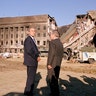 President George W. Bush and Secretary of Defense Donald Rumsfeld survey the damage at the Pentagon building Sept. 12, 2001, in Arlington, Va, a day after the Sept. 11, 2001, terrorist attacks in Washington, D.C., and New York. (Photo by David Hume Kennerly/Getty Images)