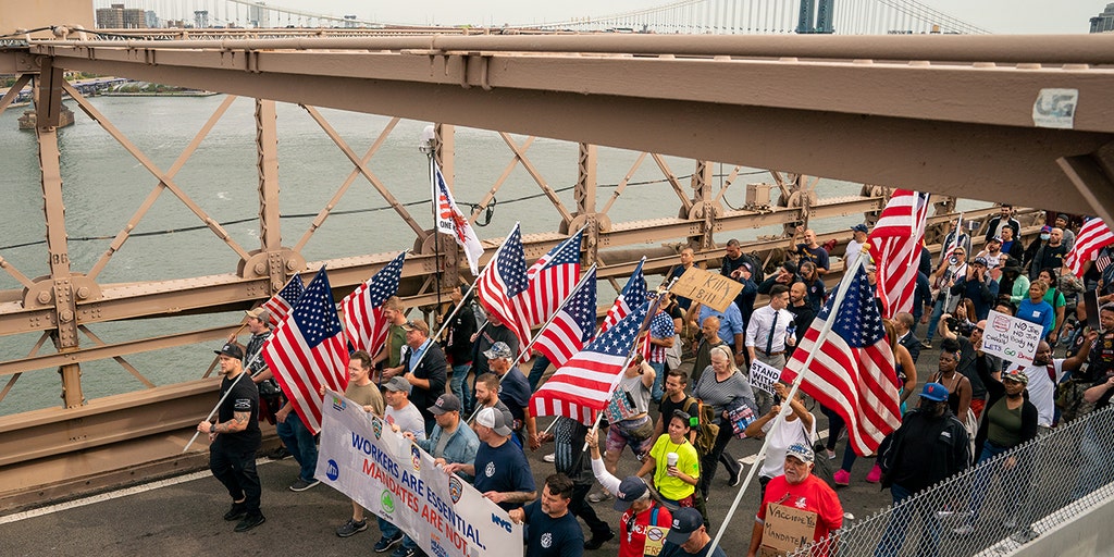 NYC workers protest vaccine mandate: 'We will not comply!' - Vimarsana News