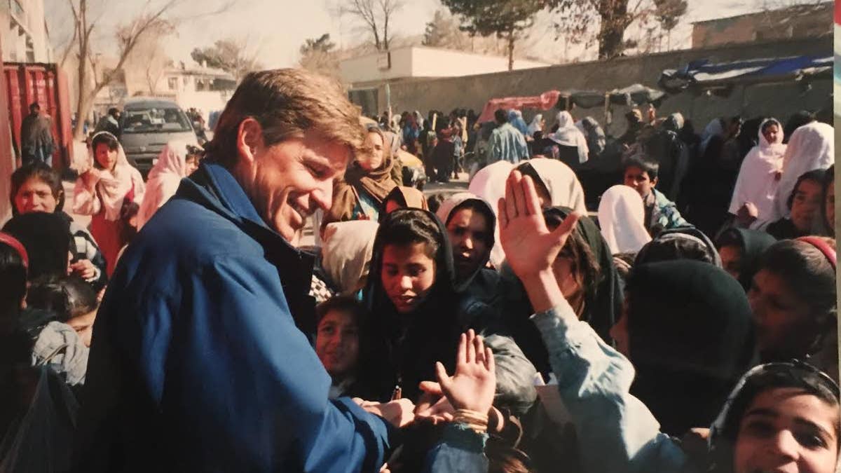 Fox News correspondent Greg Palkot with kids in Kabul, in 2002.