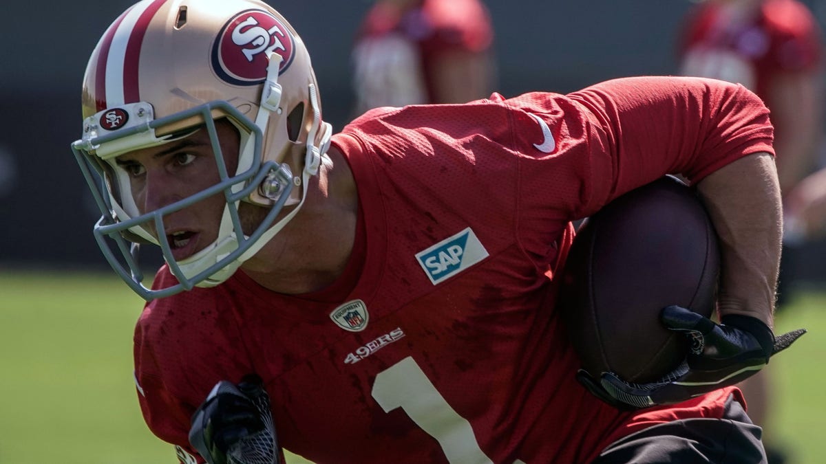 Jul 26, 2018; Santa Clara, CA, USA; San Francisco 49ers wide receiver Max McCaffrey (1) runs with the football during training camp at the SAP Performance Facility. Mandatory Credit: Stan Szeto-USA TODAY Sports