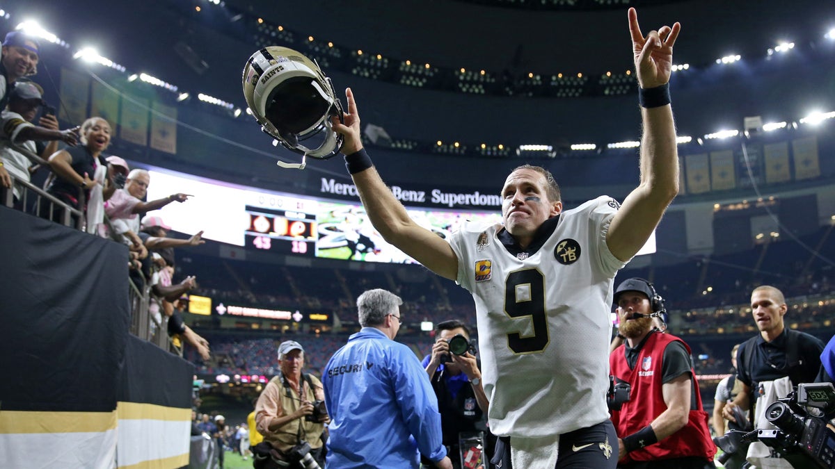 Saints quarterback Drew Brees runs off the field after beating the Washington Redskins, 43-19, at the Mercedes-Benz Superdome on Oct. 8, 2018.