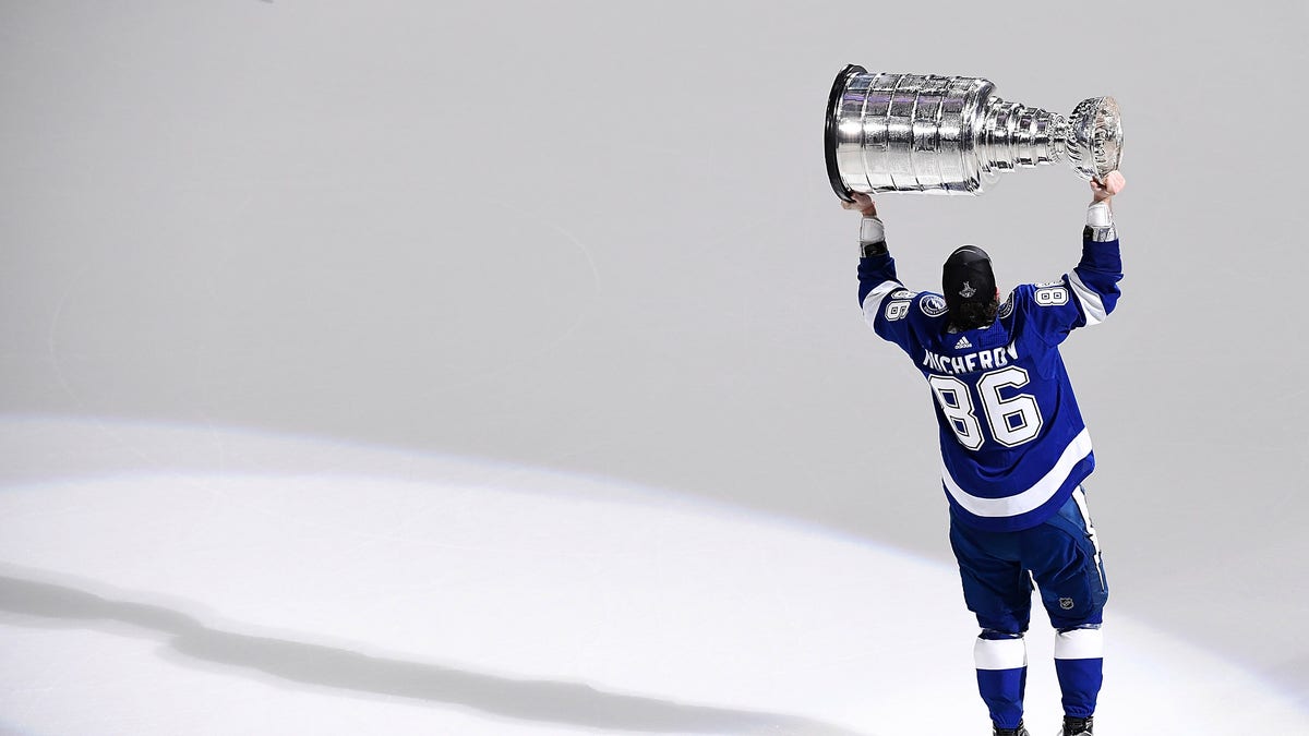  Tampa Bay Lightning right wing Nikita Kucherov hoists the Stanley Cup after the Lightning defeated the Montreal Canadiens 1-0 in game five to win the 2021 Stanley Cup Final on July 7, 2021, at Amalie Arena in Tampa, Florida. 