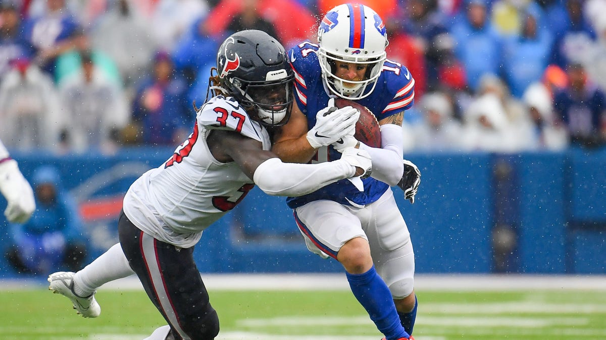 Bills wide receiver Cole Beasley (11) runs with the ball as Houston Texans running back Scottie Phillips (27) defends during the second half at Highmark Stadium.