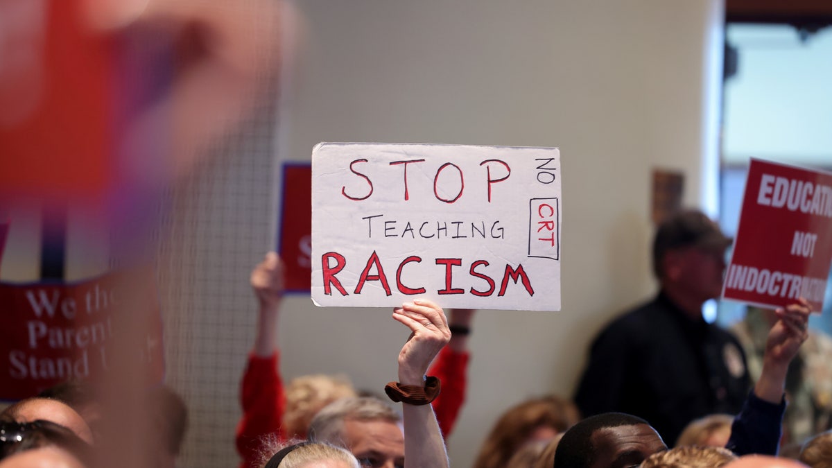 Loudoun county school meeting in ashburn virginia chaos against critical race theory