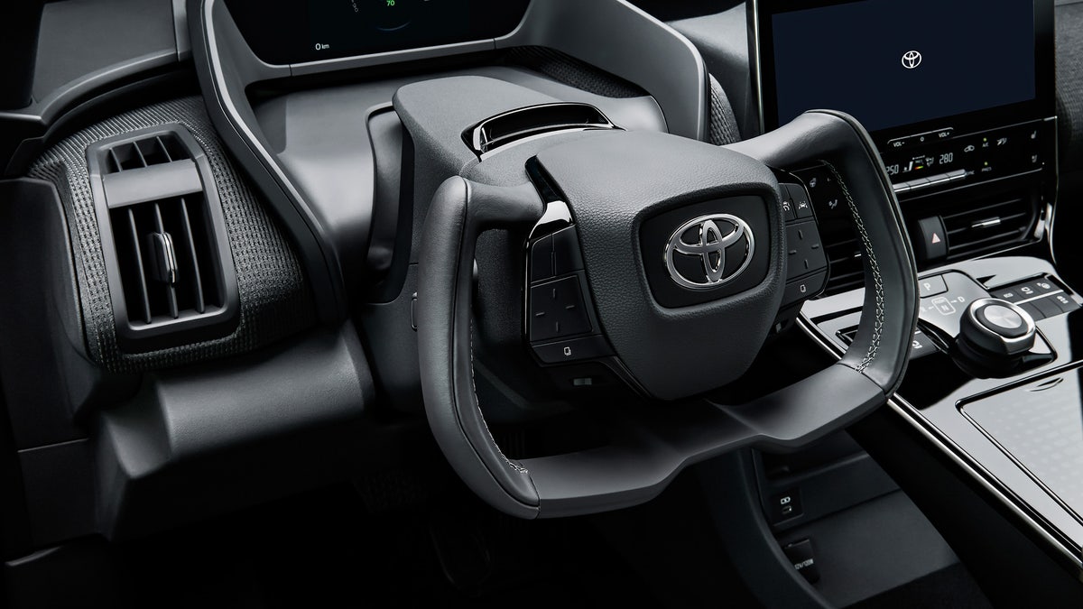 The bZ4X's drive-by-wire system uses a yoke-style steering wheel.