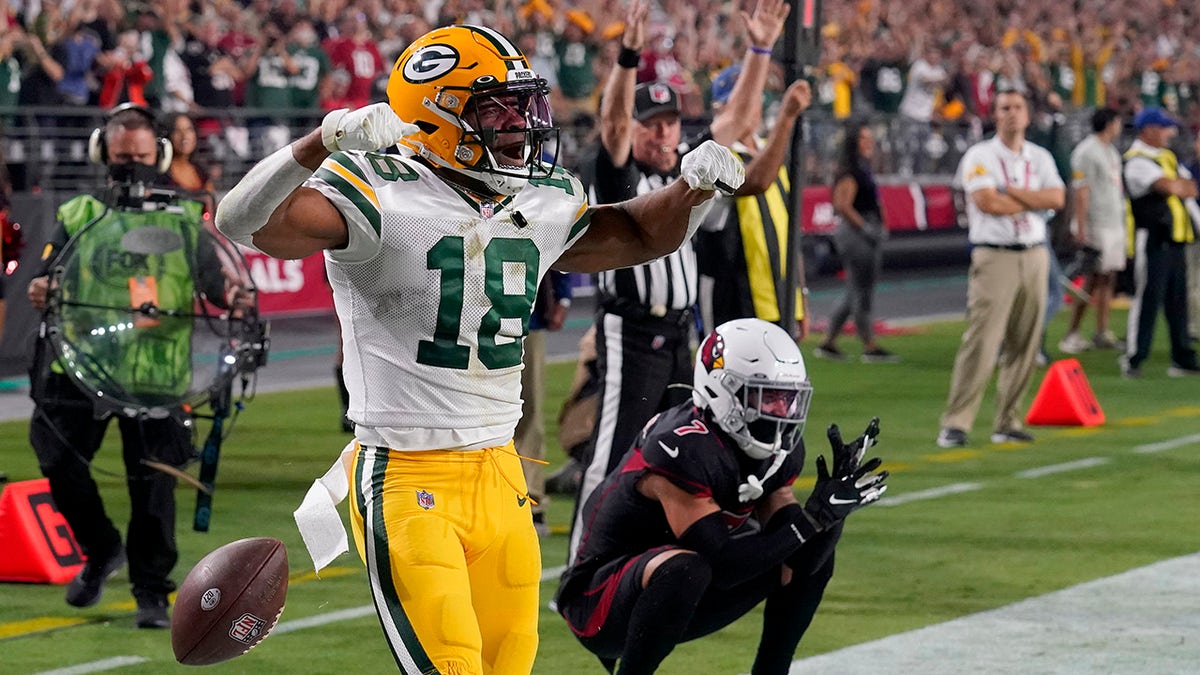 Green Bay Packers wide receiver Randall Cobb (18) celebrates his touchdown as Arizona Cardinals cornerback Byron Murphy looks on during the second half of an NFL football game, Thursday, Oct. 28, 2021, in Glendale, Ariz.
