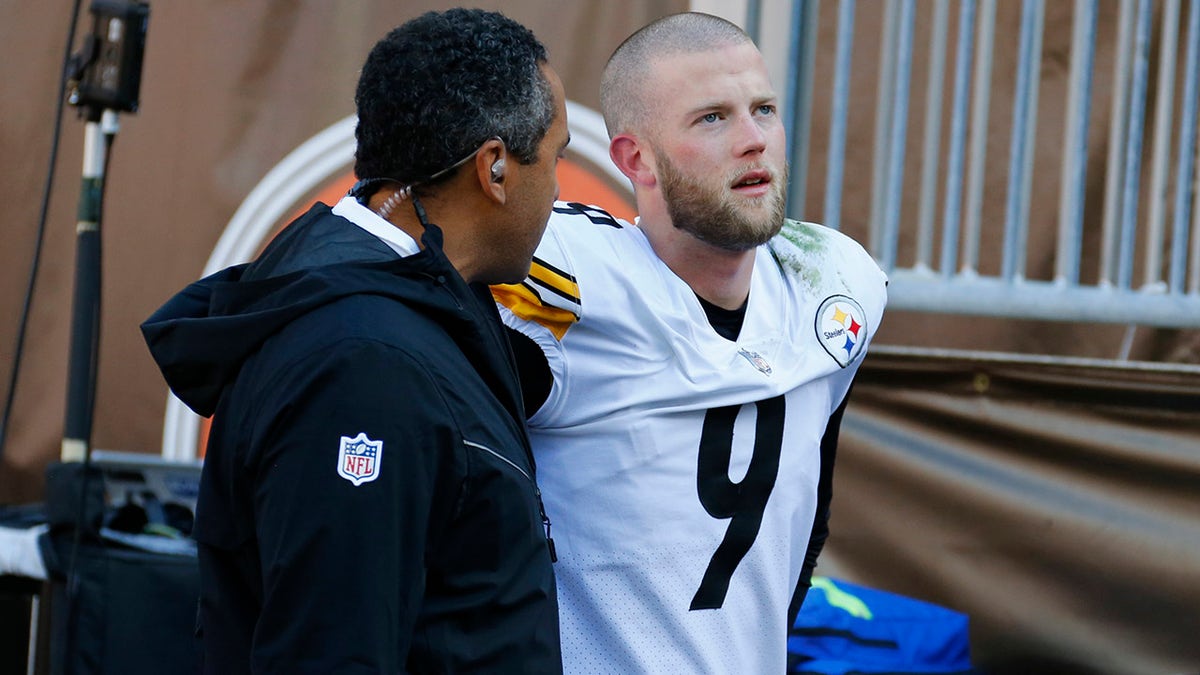 Pittsburgh Steelers kicker Chris Boswell walks off the field after an injury during the first half of the game against the Cleveland Browns, Sunday, Oct. 31, 2021, in Cleveland.