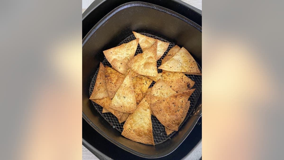 These air fryer tortilla chips only require olive oil and Cajun seasoning.