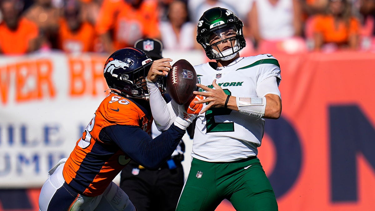 New York Jets quarterback Zach Wilson is sacked by Denver Broncos outside linebacker Von Miller during the first half of an NFL football game, Sunday, Sept. 26, 2021, in Denver. (AP Photo/Jack Dempsey)