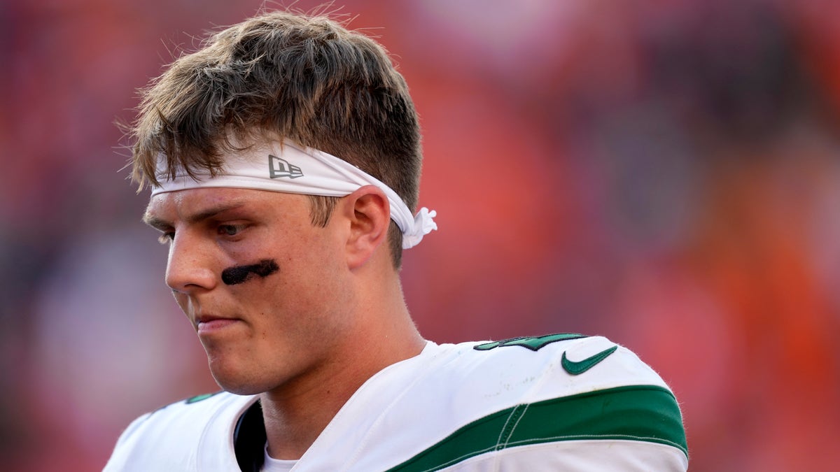 New York Jets quarterback Zach Wilson leaves the field after an NFL football game against the Denver Broncos , Sunday, Sept. 26, 2021, in Denver. The Broncos won 26-0. 