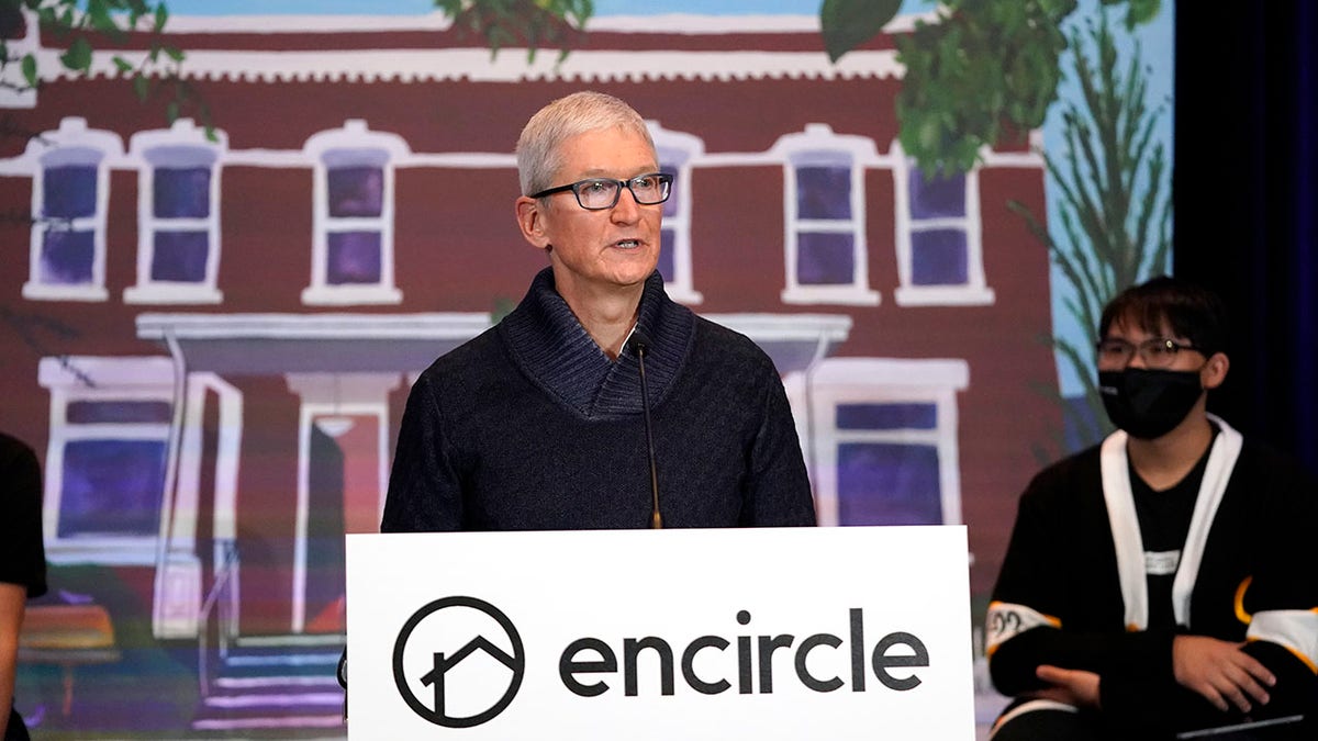 Apple's CEO Tim Cook speaks during a news conference Wednesday, Oct. 13, 2021, in Salt Lake City. Cook and NBA All-Star Dwyane Wade joined Utah leaders to announce the completion of a local advocacy group's campaign to build eight new homes for LGBTQ youth in the U.S. West.