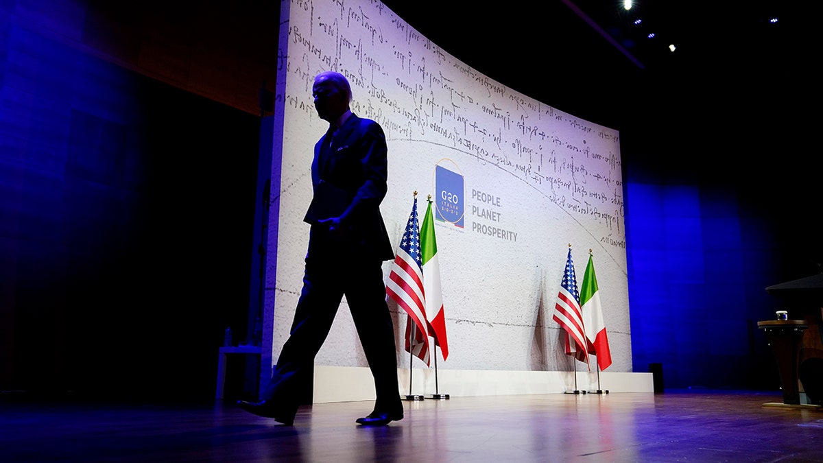 President Joe Biden walks off stage after speaking during a news conference at the conclusion of the G20 leaders summit, Sunday, Oct. 31, 2021, in Rome. (AP Photo/Evan Vucci)