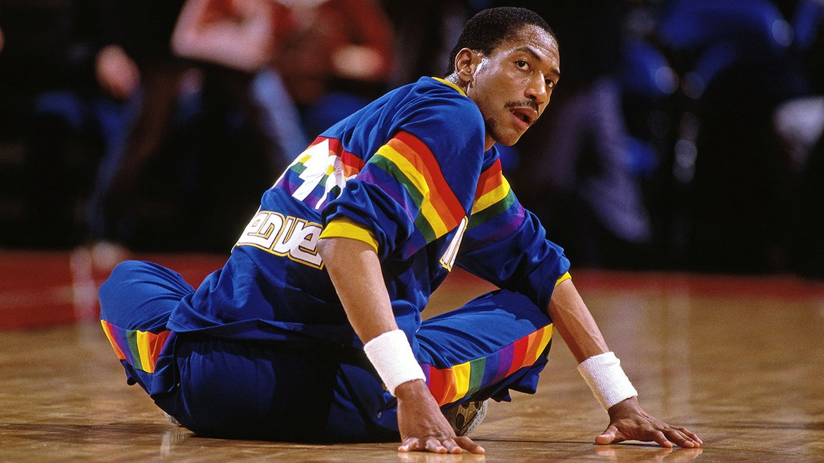 PORTLAND, OR - 1986: Alex English #2 of the Denver Nuggets stretches against the Portland Trail Blazers during a game played circa 1986 at the Veterans Memorial Coliseum in Portland, Oregon.