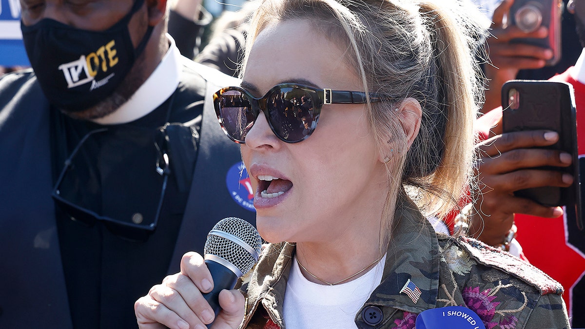 Actress and People For the American Way board member Alyssa Milano speaks at the "No More Excuses: Voting Rights Now" rally held in front of The White House on October 19, 2021 in Washington, DC. 