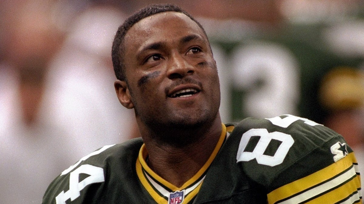 Wide receiver Andre Rison of the Green Bay Packers looks on during Super Bowl XXXI against the New England Patriots at the Superdome in New Orleans, Louisiana. The Packers won the game, 35-21.