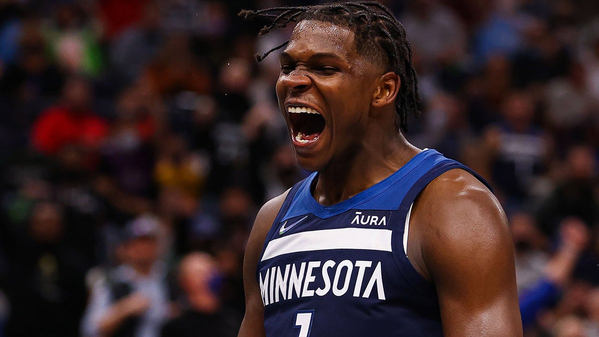 MINNEAPOLIS, MN - OCTOBER 20: Anthony Edwards #1 of the Minnesota Timberwolves reacts after dunking the ball during the fourth quarter against the Houston Rockets at Target Center on October 20, 2021 in Minneapolis, Minnesota.