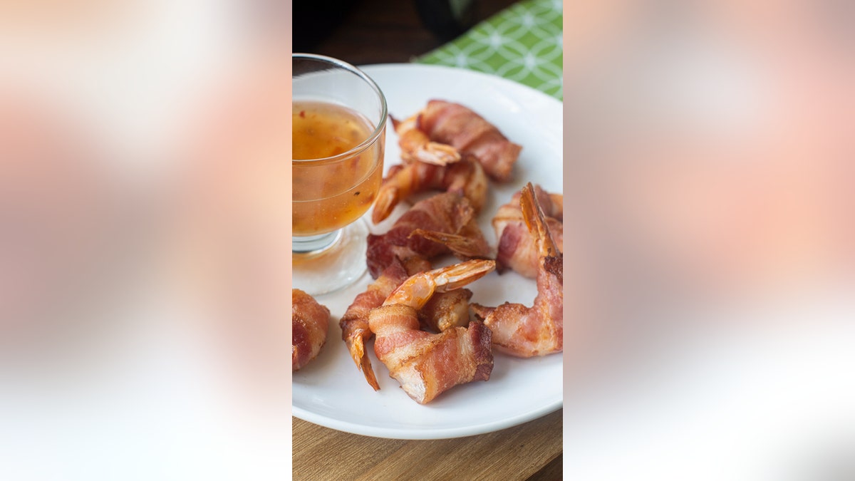 Need a last-minute appetizer for game day? This bacon-wrapped shrimp is a top contender.