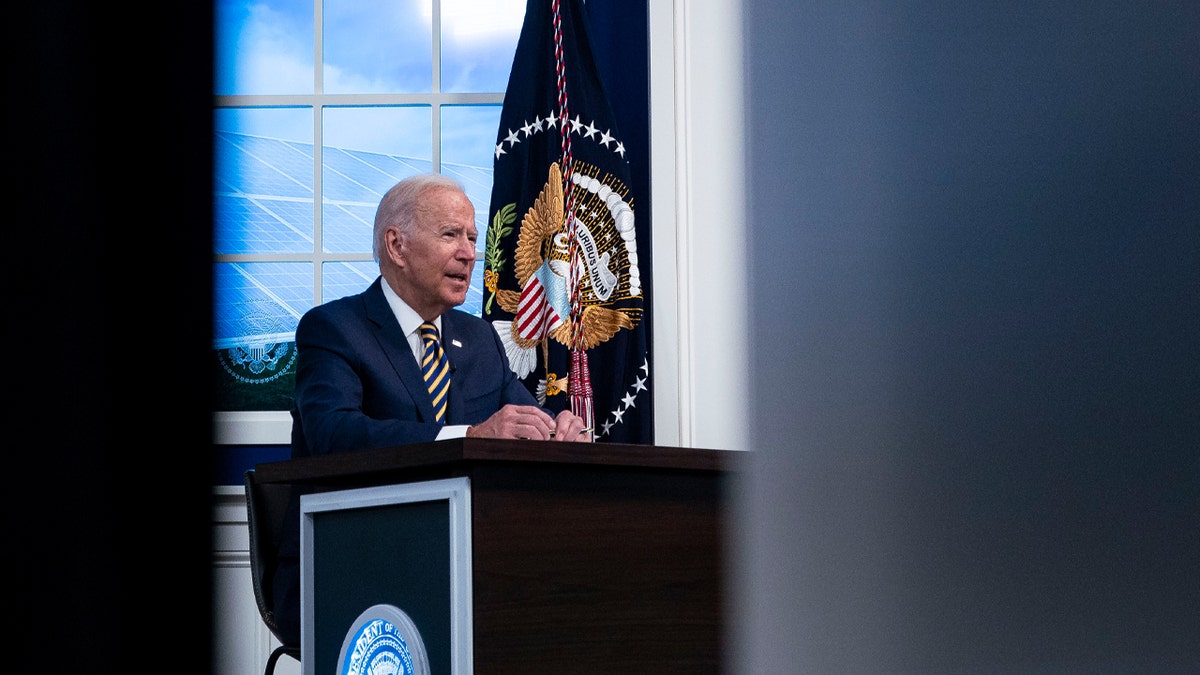 President Joe Biden speaks during a conference call on climate change with the Major Economies Forum on Energy and Climate in the South Court Auditorium in the Eisenhower Executive Office Building 