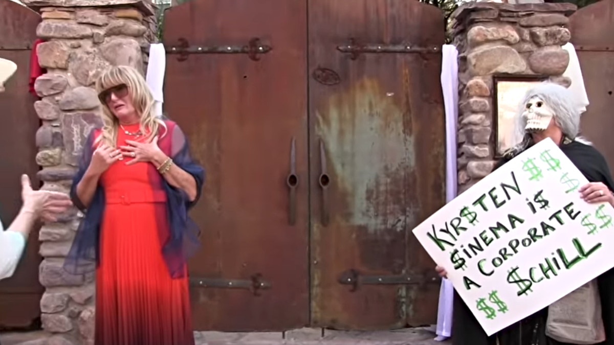 An Arizona bride and her mother pleaded with protesters outside of a wedding that Sen. Kyrsten Sinema, D-Ariz., officiated last weekend to stop disrupting the event, according to video of the demonstrators. (Credit: "Lone Protester" YouTube video screenshot)