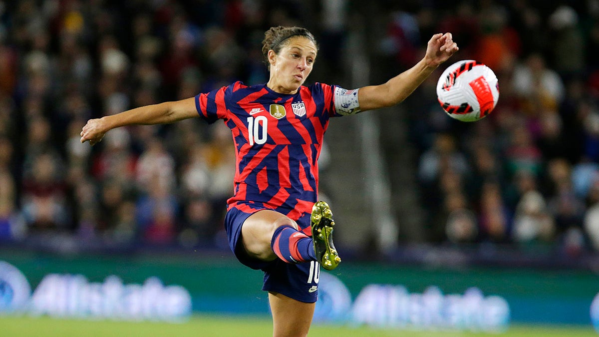 United States forward Carli Lloyd tries to stop the ball against South Korea in the first half of a soccer friendly match against South Korea, Tuesday, Oct. 26, 2021, in St. Paul, Minnesota.