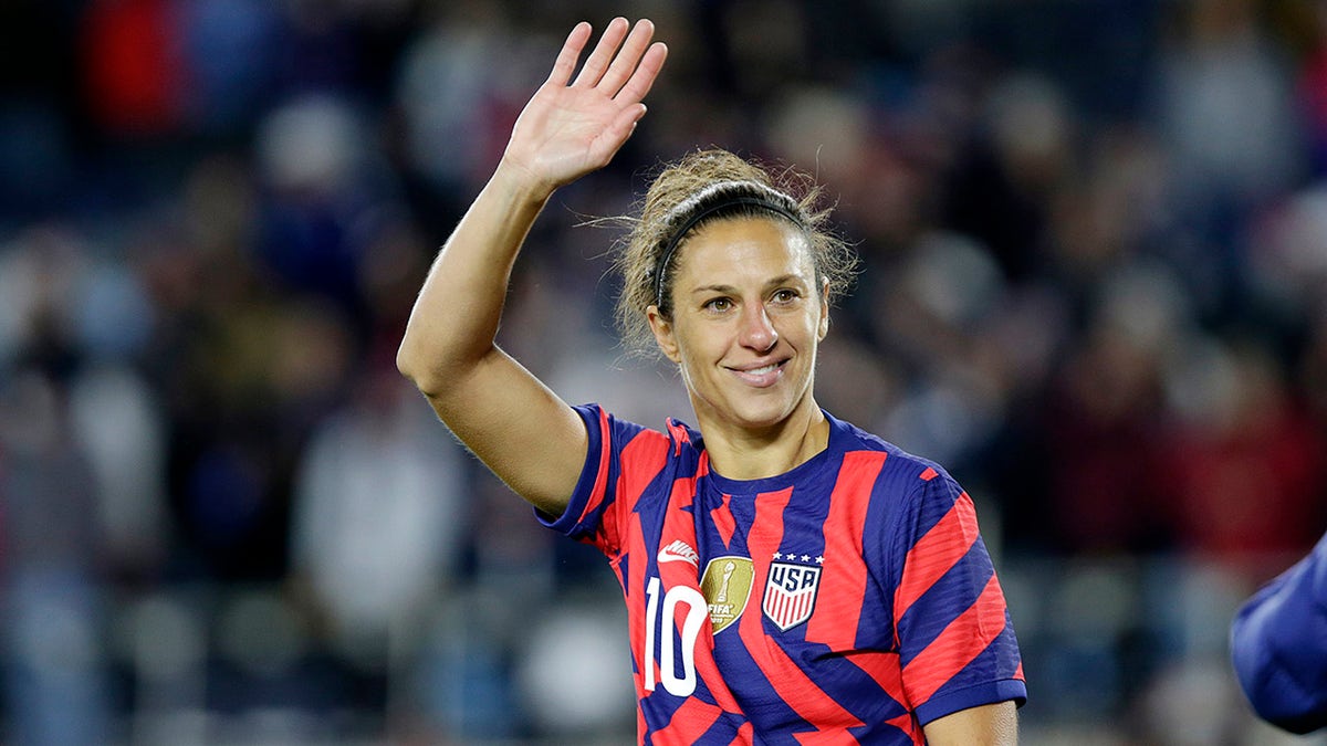 United States' forward Carli Lloyd waves to fans after a soccer friendly match against South Korea, Tuesday, Oct. 26, 2021, in St. Paul, Minn.
