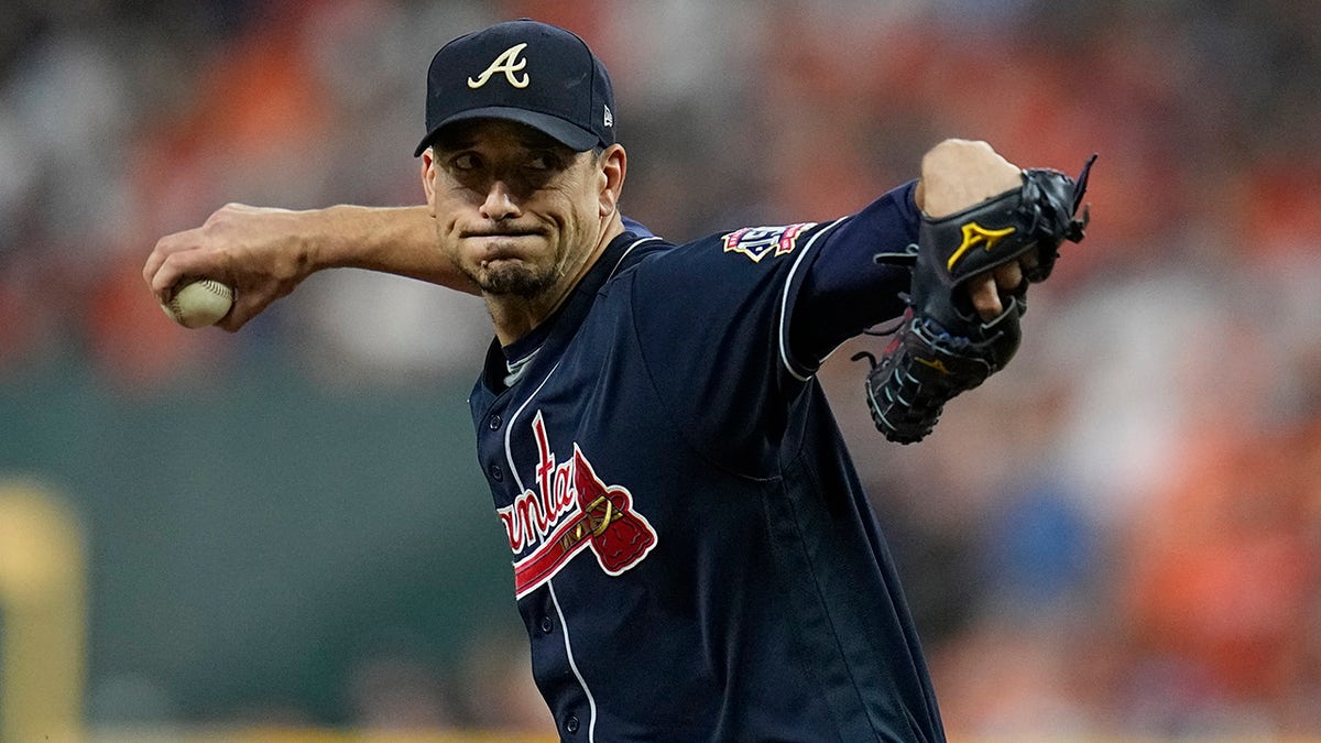 Atlanta Braves starting pitcher Charlie Morton throws during the first inning of Game 1 in baseball's World Series between the Houston Astros and the Atlanta Braves Tuesday, Oct. 26, 2021, in Houston.