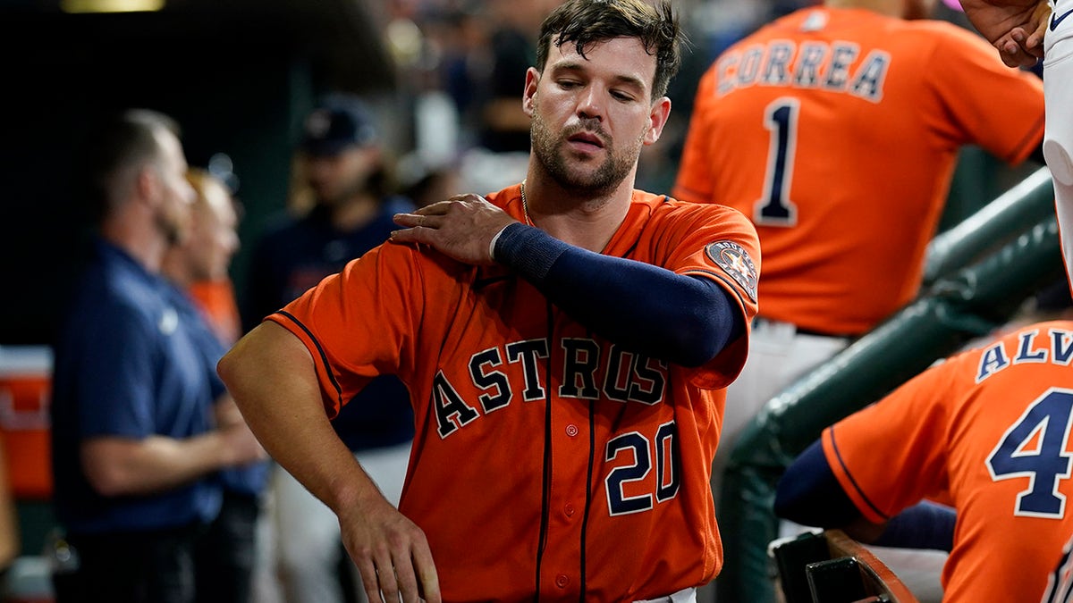 Houston Astros' Chas McCormick walks in the dugout after striking out against the Boston Red Sox during the seventh inning in Game 2 of the American League Championship Series Saturday, Oct. 16, 2021, in Houston.