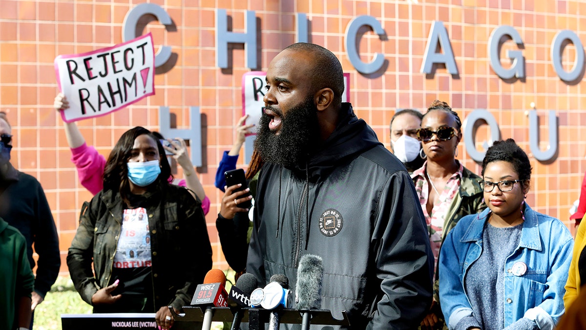 Community activist Will Calloway speaks at a rally in front of Chicago Police headquarters on Tuesday, Oct. 19, 2021, in Chicago. Calloway is among the activists calling on the Senate to reject Rahm Emanuel's nomination as President Joe Biden’s ambassador to Japan. (AP Photo/Teresa Crawford)