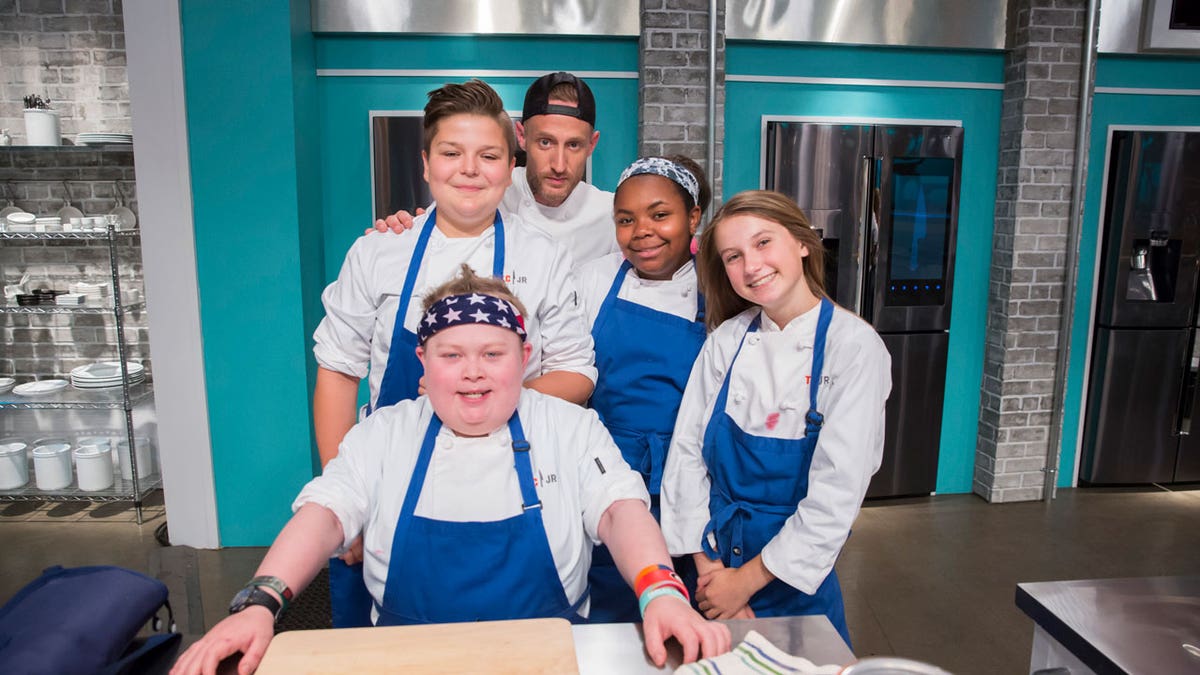 Fuller Goldsmith, front, along with Milo Fleming, Guest Judge Michael Voltaggio, Jasmine Bell and Maxine Sutton on ‘Top Chef Junior.'