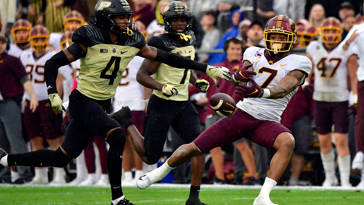 Minnesota Golden Gophers wide receiver Chris Autman-Bell (7) misses a pass in front of Purdue Boilermakers safety Marvin Grant (4) during the second quarter at Ross-Ade Stadium.