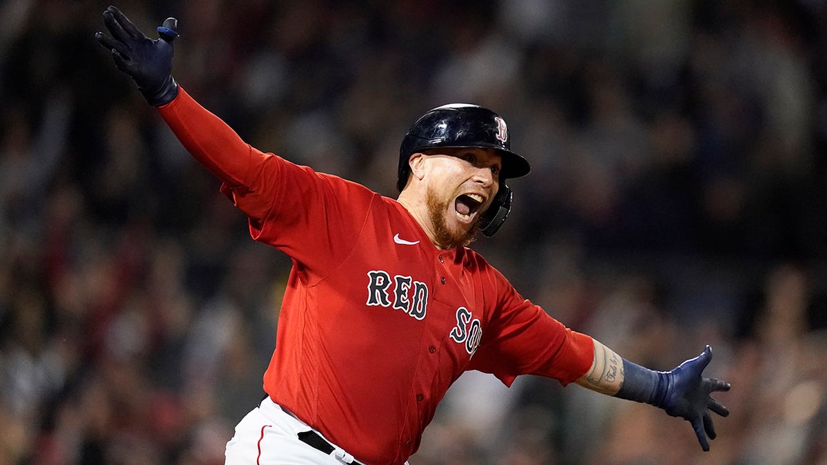 Boston Red Sox Christian Vazquez reacts after hitting a walk-off home run against the Tampa Bay Rays during the thirteenth inning during Game 3 of a baseball American League Division Series, Sunday, Oct. 10, 2021, in Boston. The Red Sox won 6-4.