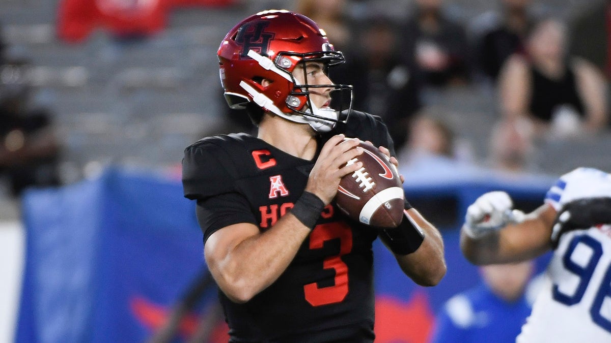 Houston quarterback Clayton Tune (3) attempts to throw the ball against SMU during the first half of an NCAA college football game Saturday, Oct. 30, 2021, in Houston.