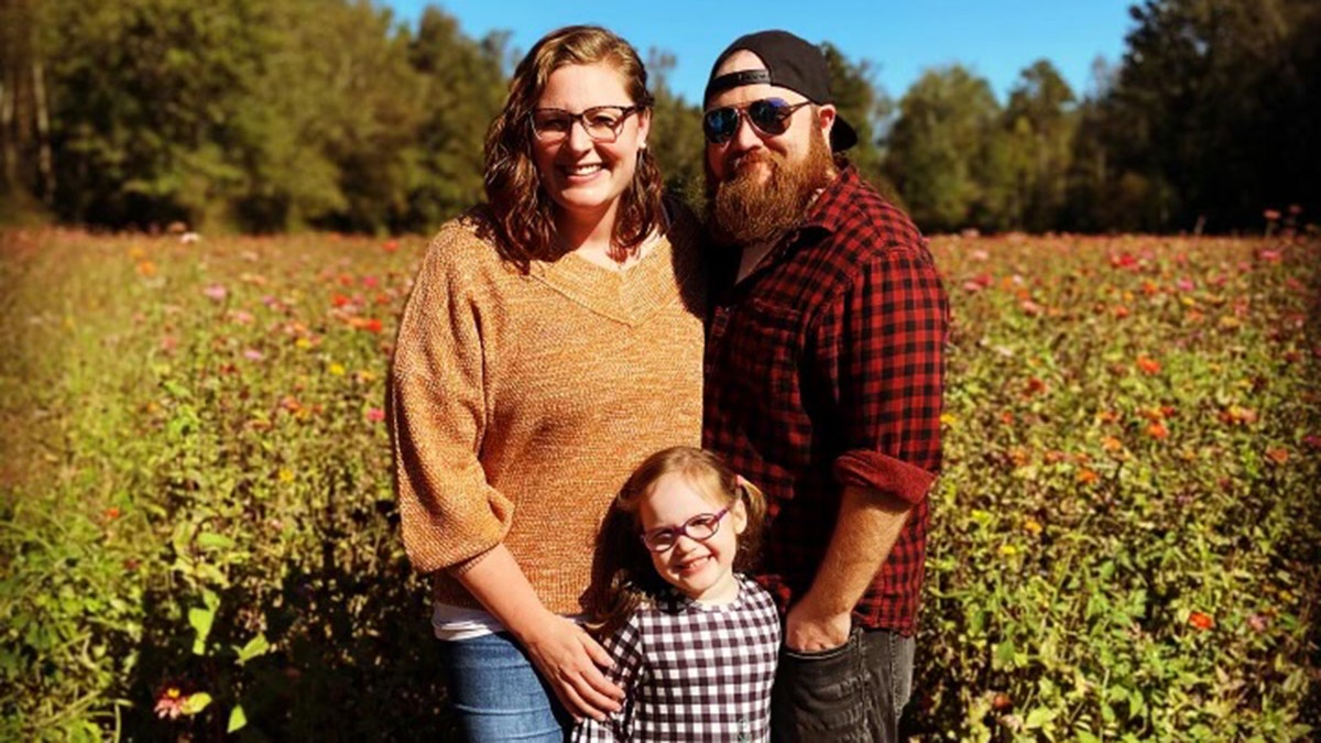 Madison and Justin Collier are pictured with their 4-year-old daughter Isla. (Courtesy of Madison Collier)