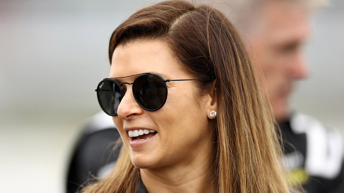 Danica Patrick talks to drivers on the grid during practice for the Inaugural Superstar Racing Experience Event at Stafford Motor Speedway on June 12, 2021 in Stafford Springs, Connecticut.