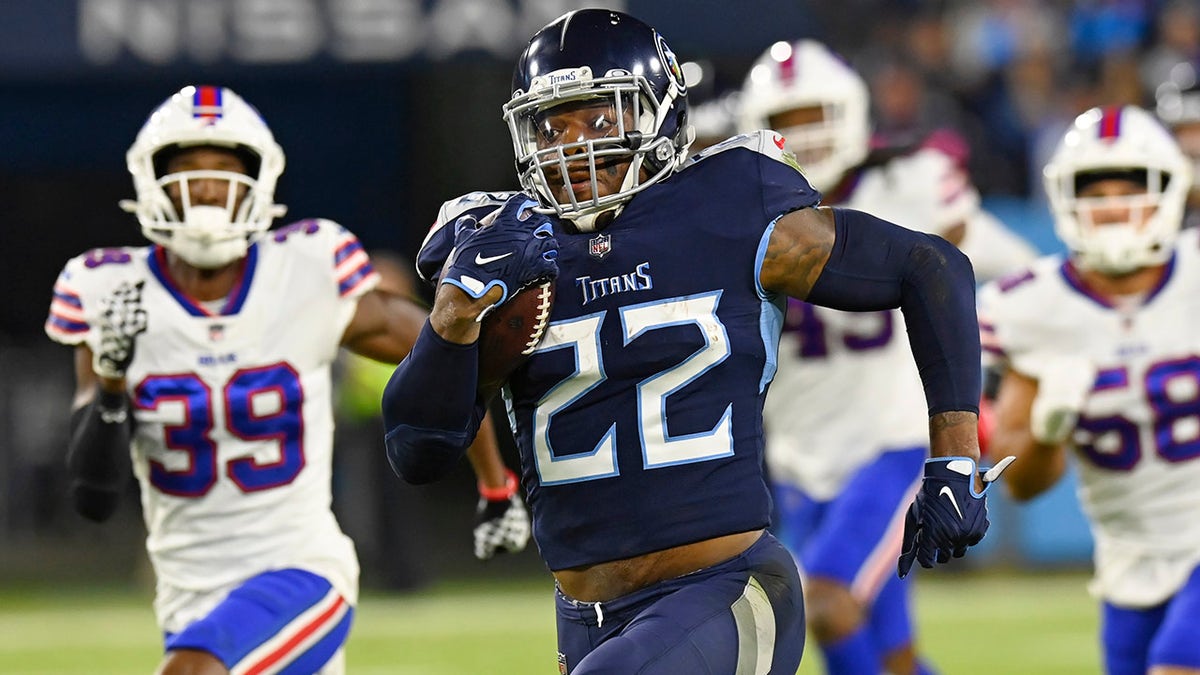 Tennessee Titans running back Derrick Henry (22) runs 76 yards for a touchdown against the Buffalo Bills in the first half of an NFL football game Monday, Oct. 18, 2021, in Nashville, Tenn.