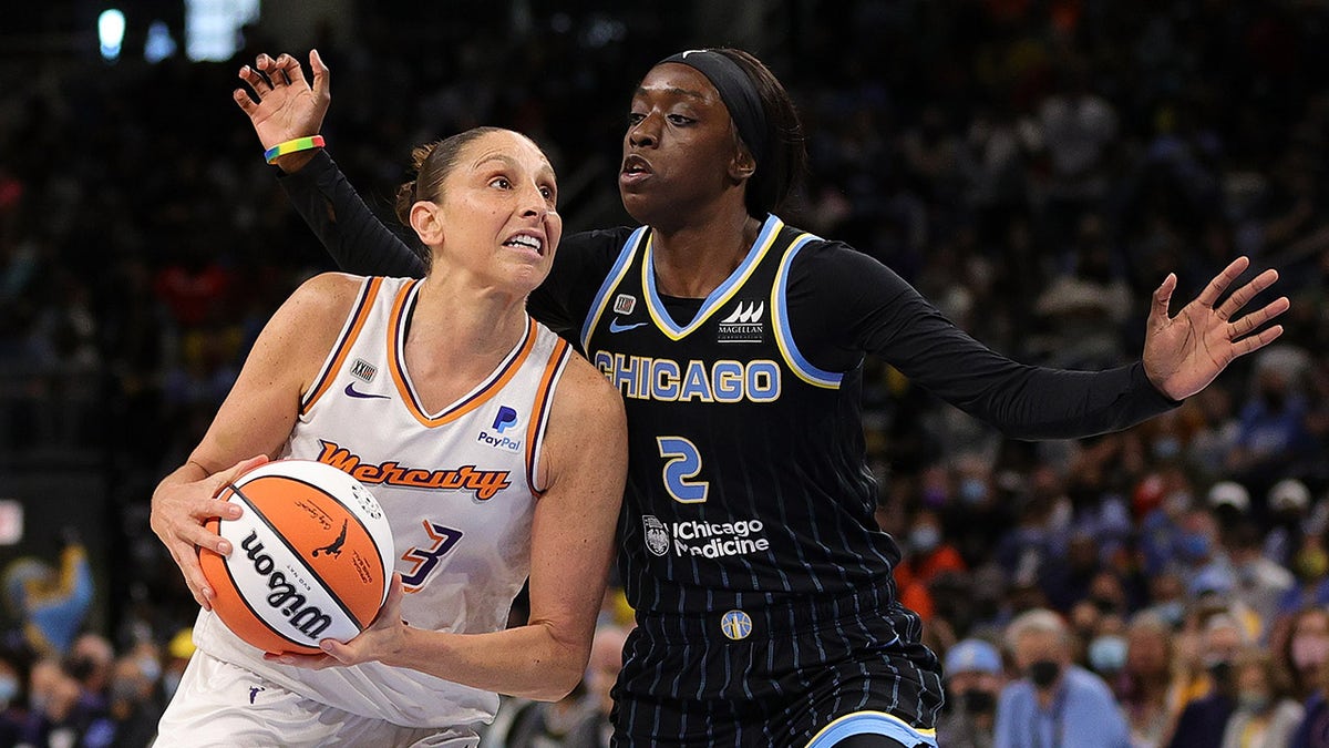 Diana Taurasi (3) of the Phoenix Mercury drives to the basket against Kahleah Copper (2) of the Chicago Sky during the first half of Game 4 of the WNBA Finals at Wintrust Arena on Oct. 17, 2021 in Chicago, Ill.