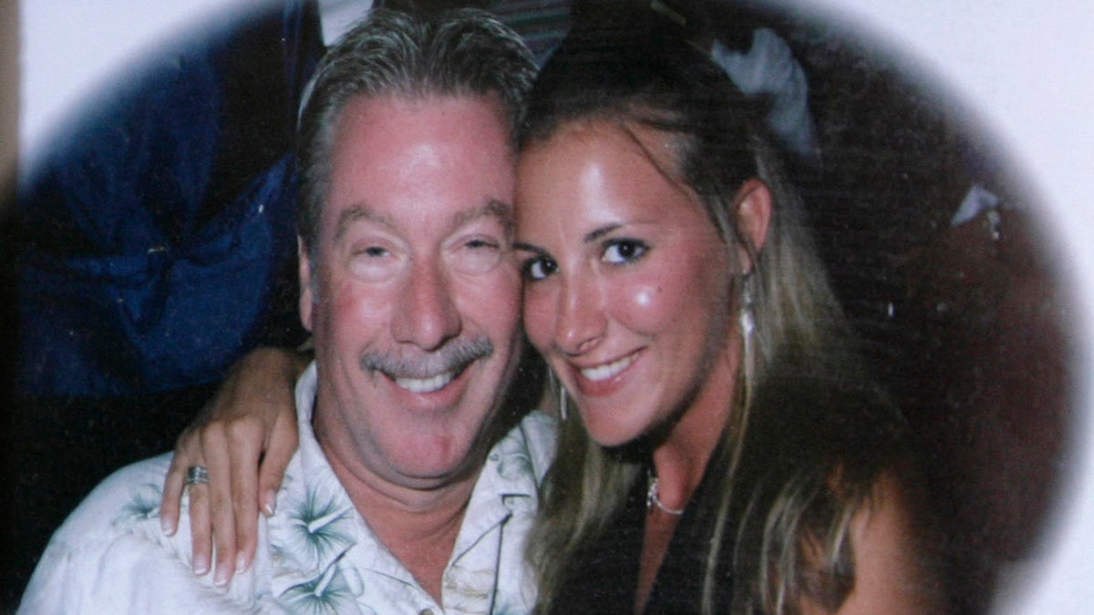 A photo of former Bolingbrook police officer Drew Peterson, and his wife, Stacy, adorned the dresser in their bedroom at their family home on March, 20, 2008 in Bolingbrook, Ill. (AP Photo/M. Spencer Green)
