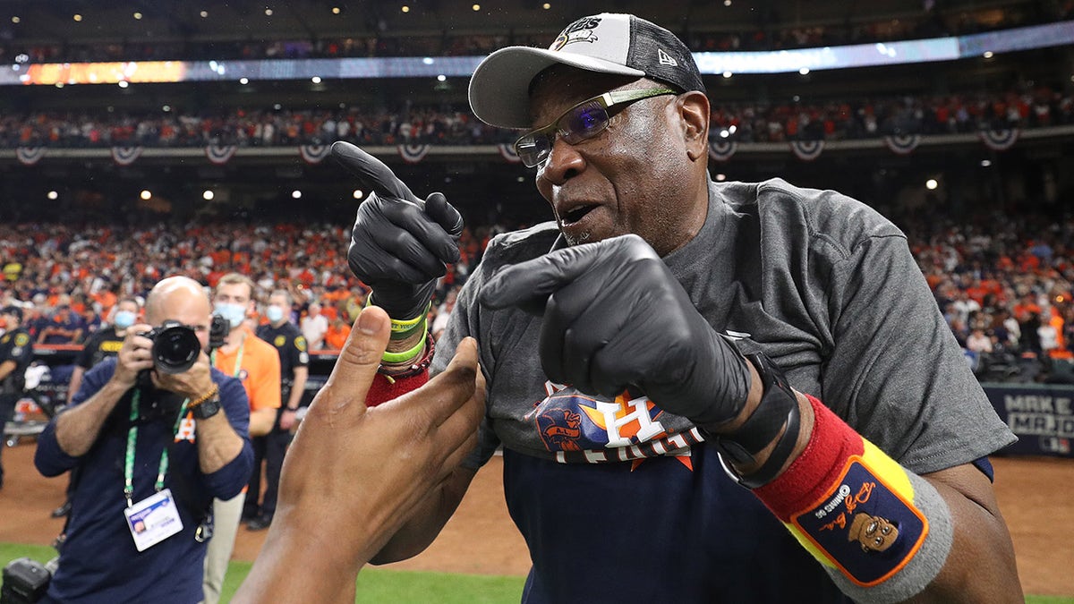 Manager Dusty Baker #12 of the Houston Astros celebrates after defeating the Boston Red Sox 5-0 in Game Six of the American League Championship Series to advance to the World Series at Minute Maid Park on Oct. 22, 2021 in Houston, Texas.