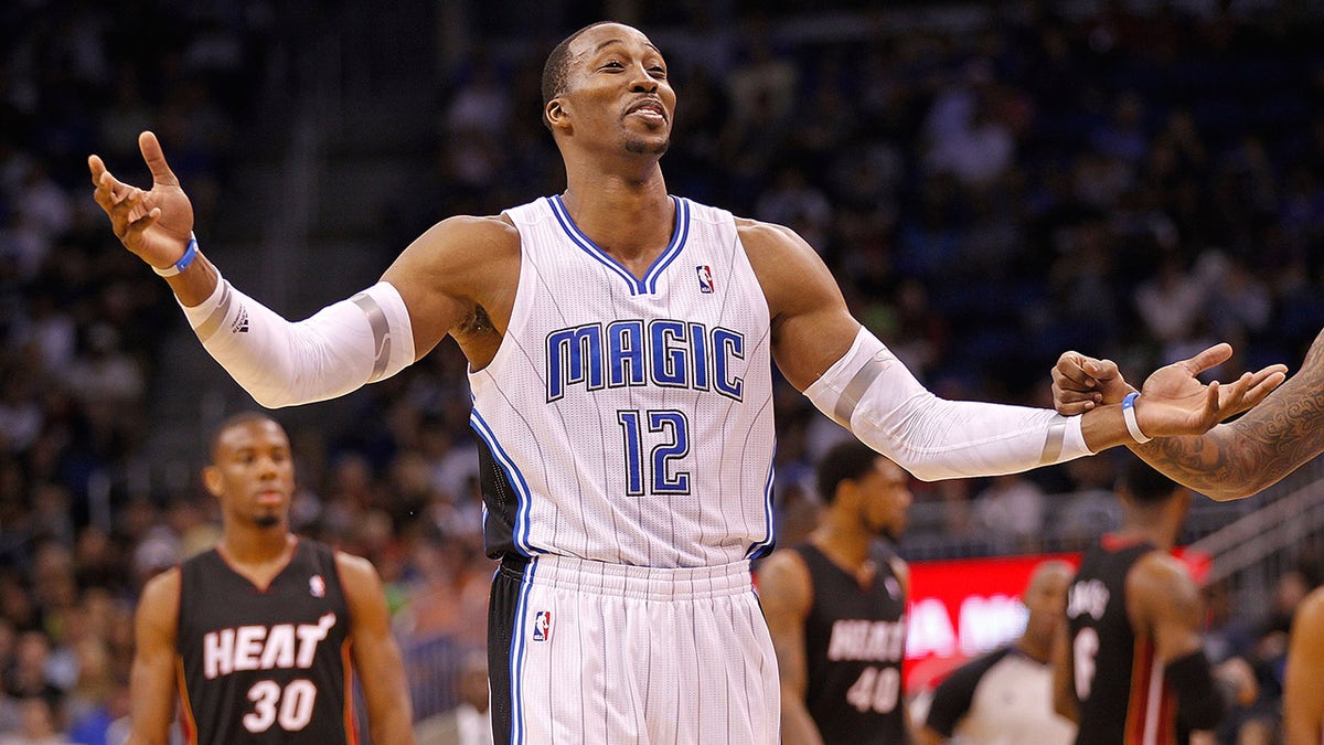 Dwight Howard of the Orlando Magic argues a call during a preseason game against the Miami Heat at Amway Center on Dec. 21, 2011, in Orlando, Florida.