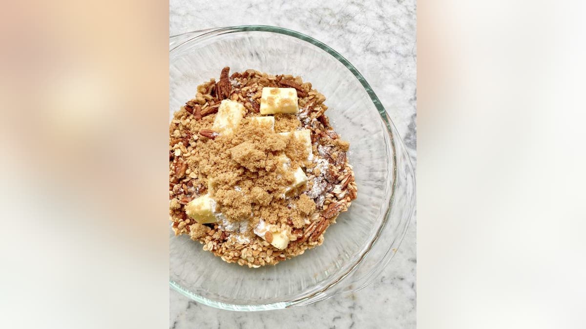 The crisp portion of Debi Morgan's recipe is made with granola, chopped pecans, cinnamon, brown sugar, flour and butter.