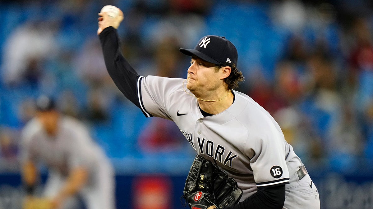 New York Yankees starting pitcher Gerrit Cole (45) throws against the Toronto Blue Jays during the first inning of baseball game in Toronto on Wednesday, Sept. 29, 2021.