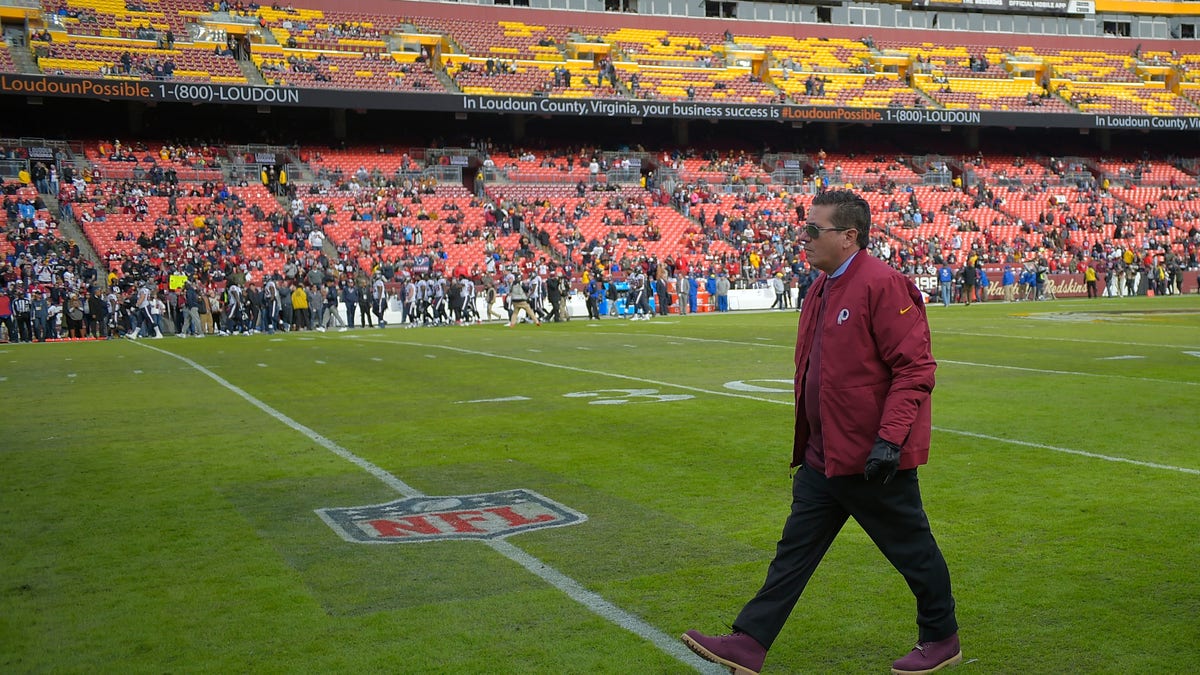 Washington team owner Dan Snyder walks off the field before his Redskins lose to the Houston Texans at FedEXField on November 18, 2018, in Landover, MD.